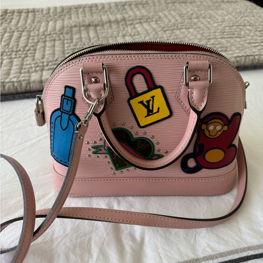 LOUIS VUITTON ALMA HANDBAG LIMITED EDITION STICKERS EPI LEATHER BAG.